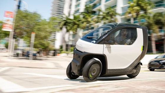 Mini ev car@ Nimbus One A компактный, наклонный автомобиль, способный к скорости до 50 миль в час с диапазоном аккумулятора для городского передвижения