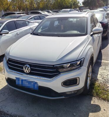 Б/у Volkswagen T-ROC 2023 280TSI DSG 2WD Time Edition с отчетами о сторонних испытаниях.